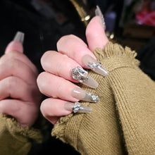 Load image into Gallery viewer, Stunning Handmade Long Press-On Nails with Glittery Silver Tips and Oversized Crystal Embellishments.
